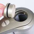 Person opening stainless steel touchless induction soap dispenser lid