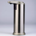 Stainless steel soap dispenser on a light gray background
