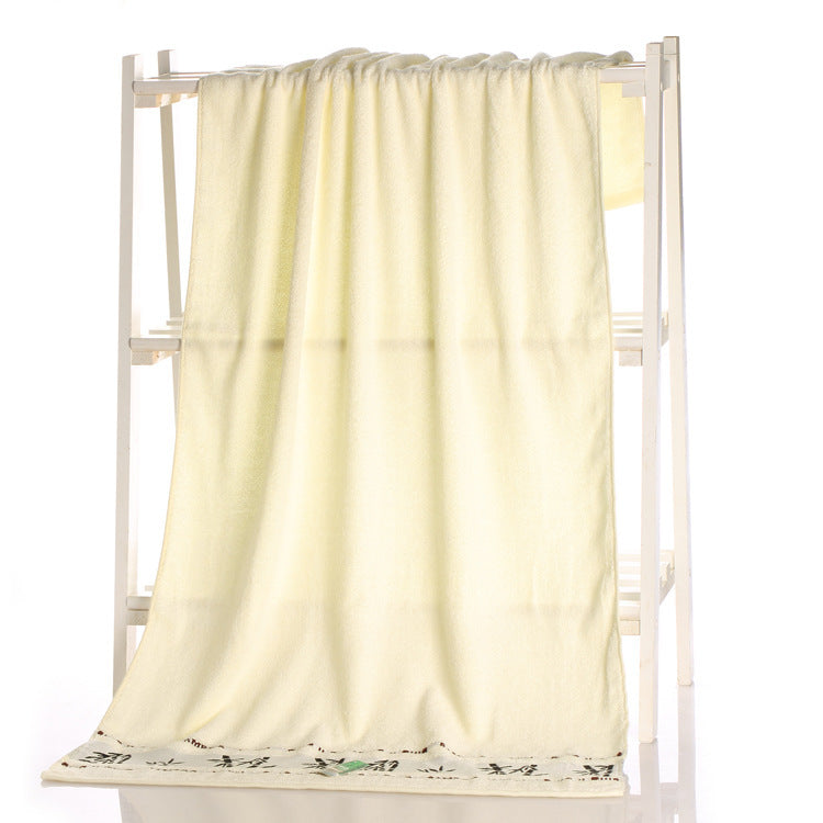 White-colored blanket draped over a white rack on a white background
