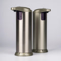 Two stainless steel soap dispensers on a white background