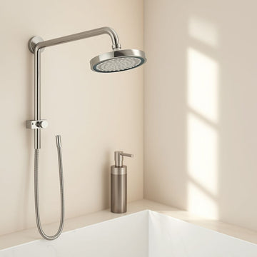 Chrome shower head with handheld shower and soap dispenser on a beige wall.