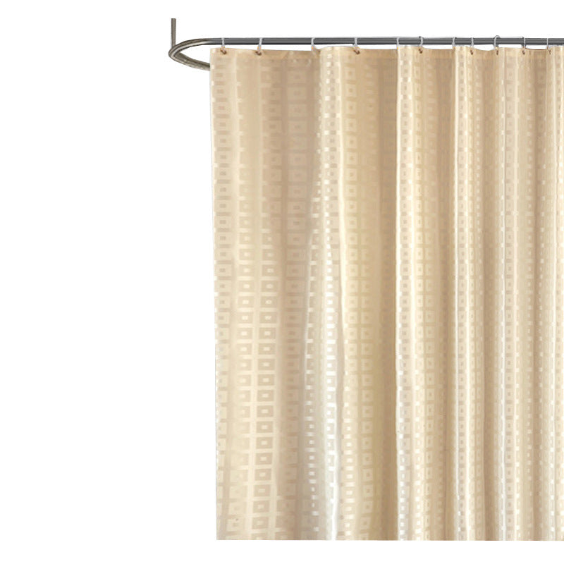 Yellow Jacquard shower curtain with a subtle pattern on a white background