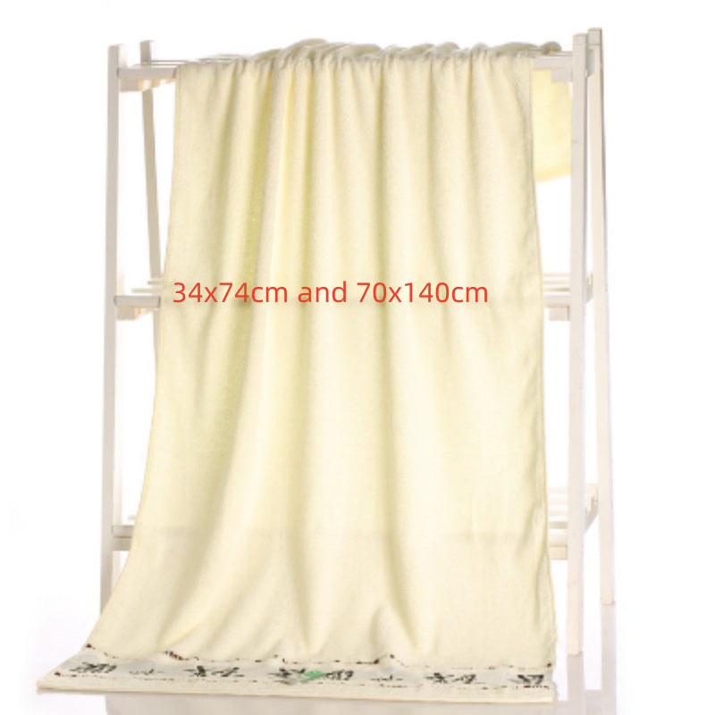 White towel on a white rack with dimensions displayed